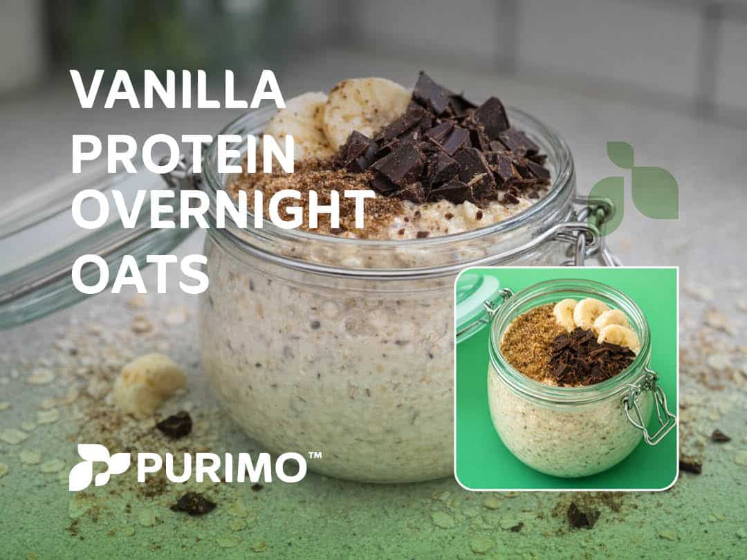 A photo of our Vanilla Protein Overnight Oats in a glass jar on the kitchen countertop, sprinkled with oats, milled flaxseed, chopped banana, and chopped dark chocolate.